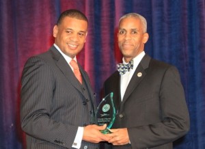 L-R: LaRian Finney (president, Visionary Marketing Group, Inc) presents the Diversity Trailblazer Award to Herbert C. Buchanan, (senior vice president and chief operating officer for the University of Maryland Medical Center). Photo Credit: Olivier Rousset.
