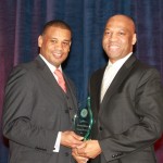 L-R: LaRian Finney (president, Visionary Marketing Group, Inc) presents the Diversity Champion Award to W. Maurice Bridges (director of Supplier Diversity at BGE). Photo Credit: Olivier Rousset.