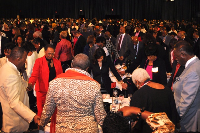 United and fired up with prayers. Attendees at the ALC Annual Prayer Breakfast join hands and pray for the nation. Report and Interviews by Ibrahim Dabo. Photo Credit: Ibrahim Dabo.